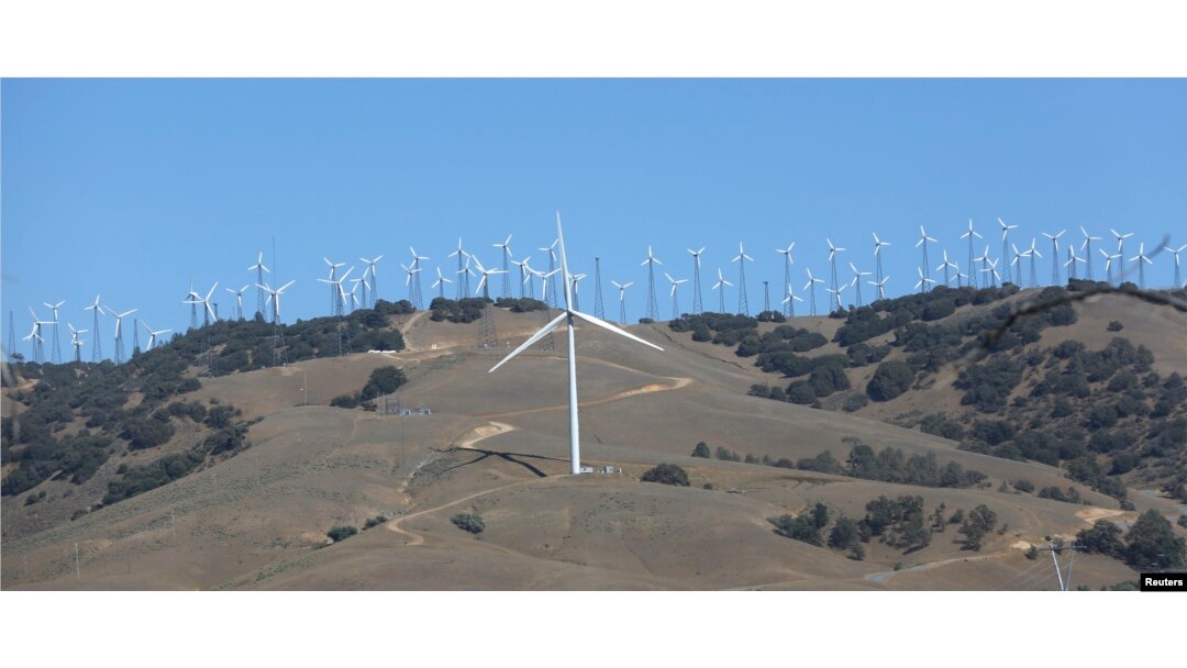 FILE - GE 1.6-100 wind turbines at a wind farm in Tehachapi, California, June 19, 2013.