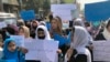 FILE - Afghan women protest during a demonstration in Kabul, Afghanistan, March 26, 2022. The U.N. said April 5, 2023, it cannot accept a Taliban decision to bar Afghan female staffers from working at the agency.