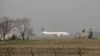 FILE - A Pakistan International Airlines passenger plane prepares to take off from the Benazir International airport in Islamabad, Feb. 9, 2016. The International Air Transport Association warned that foreign airlines could stop operating in Pakistan because of payment issues.