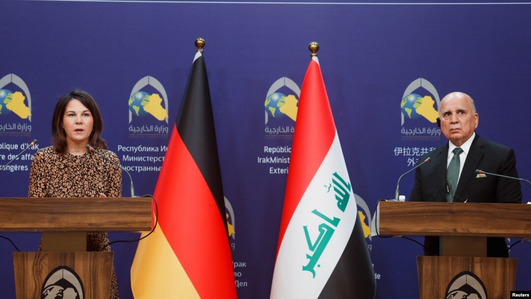 Germany's Foreign Minister Annalena Baerbock and Iraq's Foreign Minister Fuad Hussein attend a joint news conference in Baghdad, Iraq, March 7, 2023. 