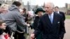 Britain's King Charles III and Queen Camilla greet people after attending the Easter Matins Service at St. George's Chapel, Windsor Castle, England, March 31, 2024. 