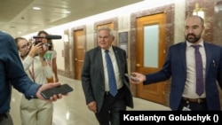 Кореспондентка української служби Голосу Америки, Катерина Лісунова під час роботи. Фото: Костянтин Голубчик.