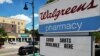 FILE - A sign advertises COVID-19 vaccine shots at a Walgreens Pharmacy in Somerville, Mass., Aug. 14, 2023. 