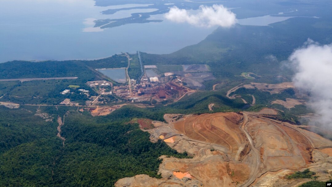 FILE - An aerial view of the Fenix Mine, run by the Swiss-based Solway Investment Group, in El Estor, Guatemala, Oct. 26, 2021.