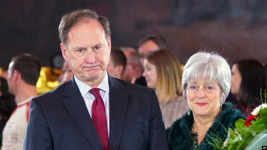 FILE - Supreme Court Justice Samuel Alito Jr., left, and his wife, Martha-Ann Alito, pay their respects at the casket of the Rev. Billy Graham at the Rotunda of the US Capitol Building in Washington, Feb. 28, 2018.