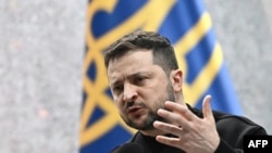 Архівне фото: президент України Володимир Зеленський під час прес-конференції в Києві, лютий 2023 року (Photo by Genya SAVILOV / AFP)