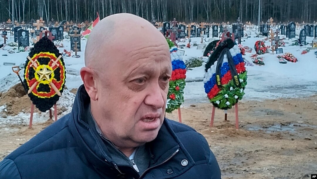 FILE - Wagner Group head Yevgeny Prigozhin attends the funeral of Dmitry Menshikov, a Wagner group fighter who died in Ukraine, at the Beloostrovskoye cemetery outside St. Petersburg, Russia, on Dec. 24, 2022.