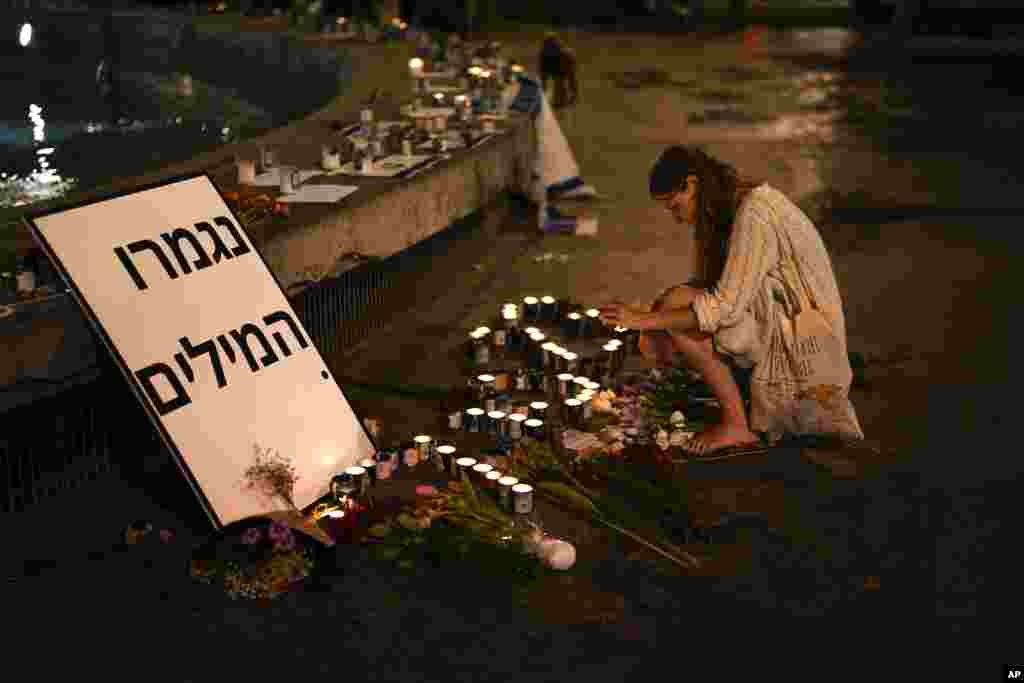 XAMAS hujumida o'lganlar xotirasiga yoqilgan shamlar, Tel-Aviv, Isroil