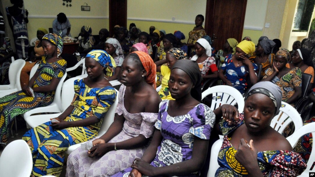 FILE - Chibok schoolgirls freed from Boko Haram captivity are seen in Abuja, Nigeria, May 7, 2017. 