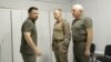 Ukrainian President Volodymyr Zelenskyy, left, Commander-in-Chief Oleksandr Syrsky, center, are seen during their visit to Sumy, Aug. 22, 2024.