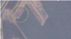 북러 무기 거래 현장으로 알려진 라진항에서 11일 컨테이너와 함께 대형 선박(원 안)이 발견됐다. 사진=Planet Labs