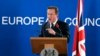 British Prime Minister David Cameron speaks during a media conference after an EU summit at the EU Council building in Brussels, on Friday, Oct. 24, 2014.