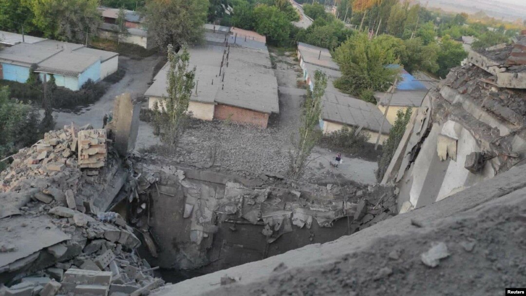 This handout from the State Emergency Service of Ukraine shows a residential building damaged by a Russian military strike, as Russia's attack on Ukraine continues, in the town of Toretsk, Donetsk region, Ukraine July 28, 2022.