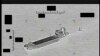 This photo released by the US Navy shows the Iranian Revolutionary Guard ship 'Shahid Bazair', left, towing a US Navy Saildrone Explorer in the Persian Gulf on Aug. 30, 2022. 