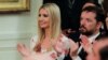 White House Senior Advisor Ivanka Trump applauds along with White House Director of the Domestic Policy Council Joe Grogan at an event held by President Donald Trump to tout his administration's environmental policies at the White House, July 8, 2019.