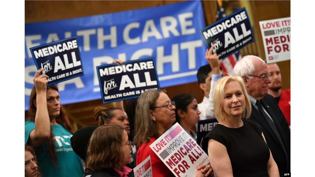 Democratic 2020 presidential hopefuls Sen. Kirsten Gillibrand (D-NY) and Bernie Sanders (I-VT) attend a Medicare For All event on Capitol Hill in Washington, April 10, 2019.