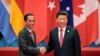 中国主席习近平和印尼总统佐科·维多多在G20杭州峰会上握手（2016年9月4日）