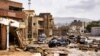Uništena vozila i zgrade u istočnom libijskom gradu Derna posle poplava (Foto:The Press Office of Libyan Prime Minister / AFP)
