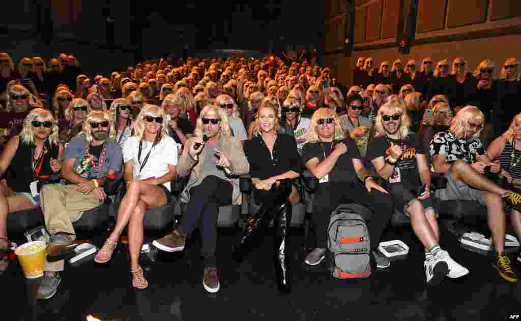 Actress Charlize Theron (center) attends the "Atomic Blonde" screening with Comic Con fans in San Diego, California, July 22, 2017.