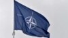 FILE - A flag of the North Atlantic Treaty Organization flies at its headquarters in Brussels on Nov. 16, 2022. 