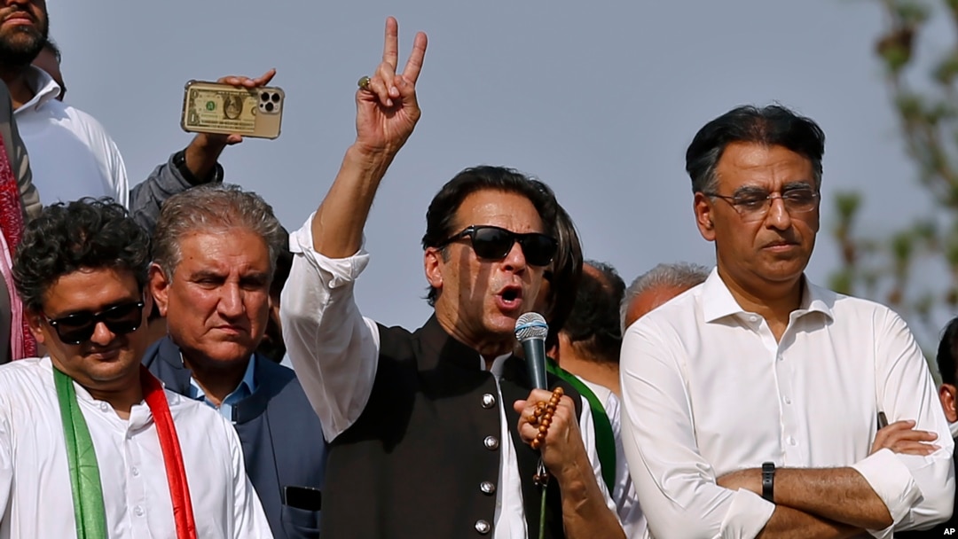 FILE - Pakistan’s former Prime Minister Imran Khan, center, speaks during a rally in Islamabad, May 26, 2022. 