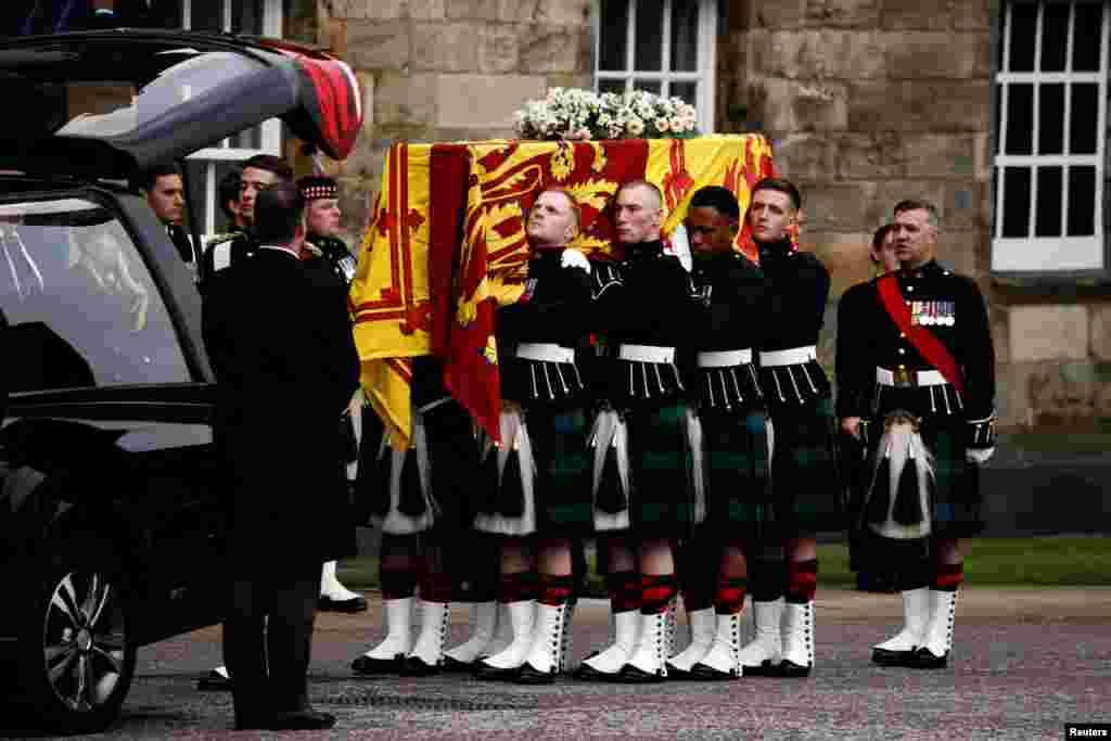The hearse carrying the coffin of Britain's Queen Elizabeth arrives at the Palace of Holyroodhouse in Edinburgh, Scotland, Sept. 11, 2022.