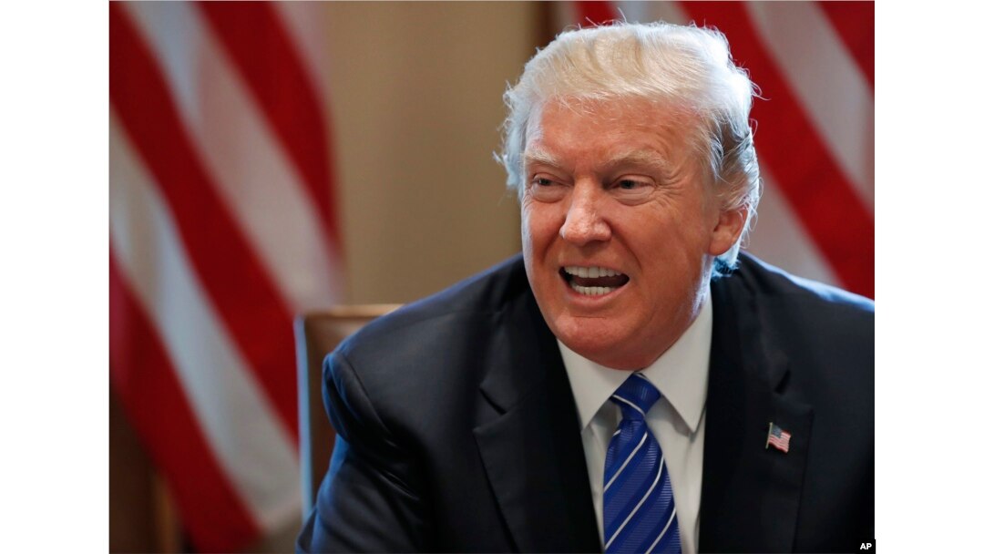 President Donald Trump speaks in the Cabinet Room of the White House in Washington, Sept. 12, 2017.