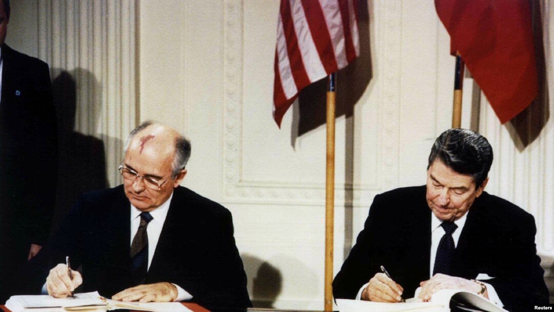 FILE - U.S. President Ronald Reagan (R) and Soviet President Mikhail Gorbachev sign the Intermediate-Range Nuclear Forces (INF) treaty at the White House in Washington, Dec. 8, 1987.