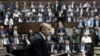 Turkey's President and the leader of ruling Justice and Development Party Recep Tayyip Erdogan addresses his supporters at the parliament in Ankara, Turkey, Tuesday, July 25, 2017. Erdogan has accused Israel of using terrorism as a pretext to take over holy sites in Jerusalem from Muslims and called on all Muslims to defend the holy sites by visiting Jerusalem at every occasion or by sending aid to Muslims there.