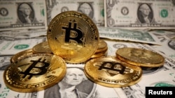 Bitkoin va AQSh dollari