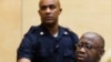 FILE - Former Ivory Coast President Laurent Gbagbo attends a confirmation of charges hearing in his pre-trial at the International Criminal Court in The Hague, Feb. 19, 2013.