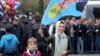 FILE - Supporters of Turkey's President Recep Tayyip Erdogan gather for a rally ahead of the upcoming referendum, in the predominantly Kurdish Diyarbakir, in southeastern Turkey, April 1, 2017. 