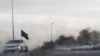 Smoke rises during heavy clashes between rival factions in Tripoli, Libya, May 27, 2017.
