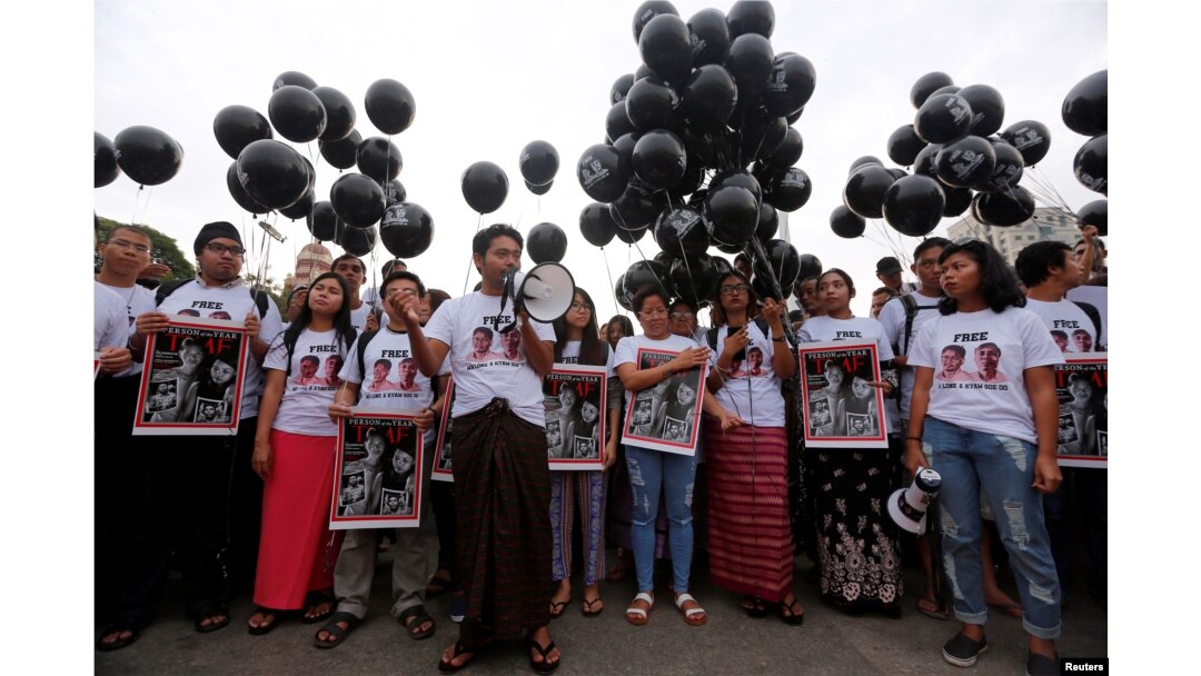 Activists gather at a rally, calling for the release of imprisoned Reuters journalists Wa Lone and Kyaw Soe Oo, one year after they were arrested, in Yangon, Myanmar, Dec.12, 2018.