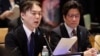 Koichiro Iizuka, left, of Japan, speaks during a meeting as Takuya Yokota, right, listens, May 3, 2018, at the United Nations headquarters. 