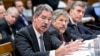From left to right, Deputy Attorney General James Cole, Robert S. Litt, general counsel in the Office of Director of National Intelligence, NSA Deputy Director John C. Inglis, testify at a House Judiciary hearing on domestic spying on on Capitol Hill, July 17, 2013.