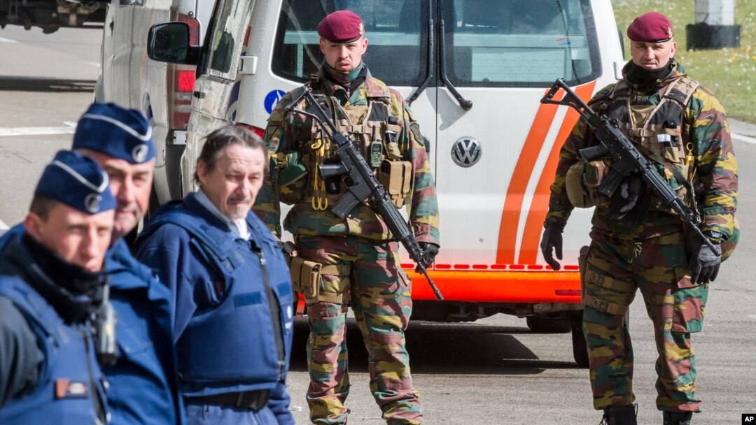 Belgian police men and soldiers secure the area outside Zaventem Airport in Brussels, March 29, 2016. 