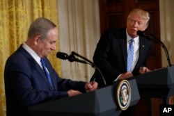 FILE - President Donald Trump and Israeli Prime Minister Benjamin Netanyahu participate in a joint news conference in the East Room of the White House in Washington, Feb. 15, 2017.