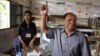 Heng Samrin, president of Cambodia's National Assembly casts his vote in Kampong Cham, July 28, 2013. (Heng Reaksmey/VOA Khmer)