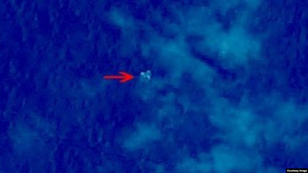 Debris from what could be Malaysian Airlines flight MH370 is seen in this satellite image from China's State Administration for Science, Technology and Industry for National Defense.