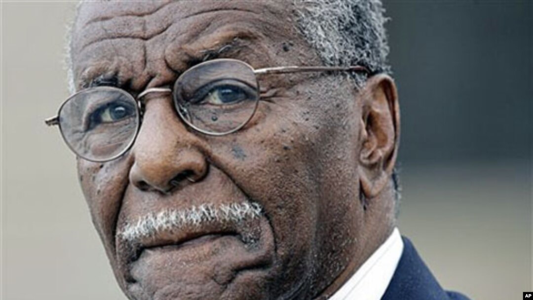 In this June 2007 file photo, Civil rights activist the Rev. Fred Shuttlesworth departs the Federal Courthouse in Montgomery, Alabama.