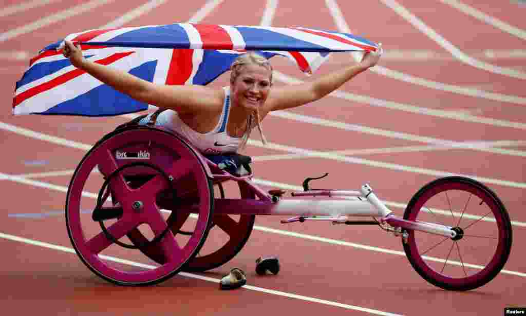 Great Britain's Samantha Kinghorn celebrates winning the Women's 100m T53 Final at the IAAF World Para Athletics Championships in London.