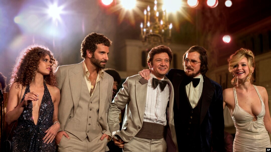 This film image released by Sony Pictures shows, from left, Amy Adams, Bradley Cooper, Jeremy Renner, Christian Bale and Jennifer Lawrence in a scene from "American Hustle." The film was nominated for an Academy Award for best picture on Thursday, Jan. 1