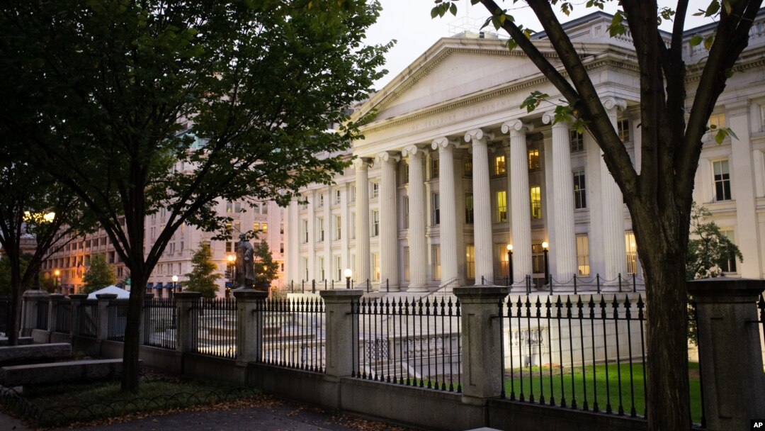 FILE - The U.S. Treasury Building is seen in Washington, Oct. 16, 2013.