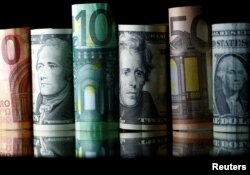 FILE - Dollar, Euro and Pound banknotes are seen in this picture illustration taken April 28, 2017.