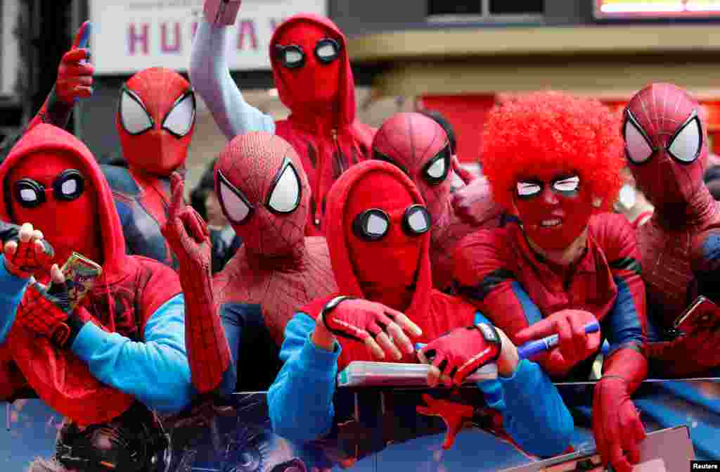 Fans in Spider-Man costumes wait for the arrival of cast member Tom Holland and director Jon Watts during the Japan premiere of "Spider-Man: Homecoming" in Tokyo, Japan.