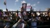 Supporters of Iranian President Hassan Rouhani in the May 19 presidential election attend his campaign rally, in Isfahan, Iran, Sunday, May 14, 2017.