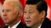 资料照：时任中国国家副主席习近平在北京接待到访的时任美国副总统拜登。(2011年8月19日)