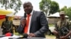 M23 rebel leader Bertrand Bisimwa (C) is seen in a March 7, 2013, file photo.