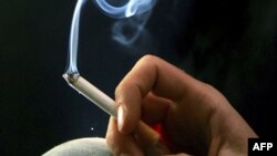AQShda sigareta qutilarida chekish zarari tasvirlanadi